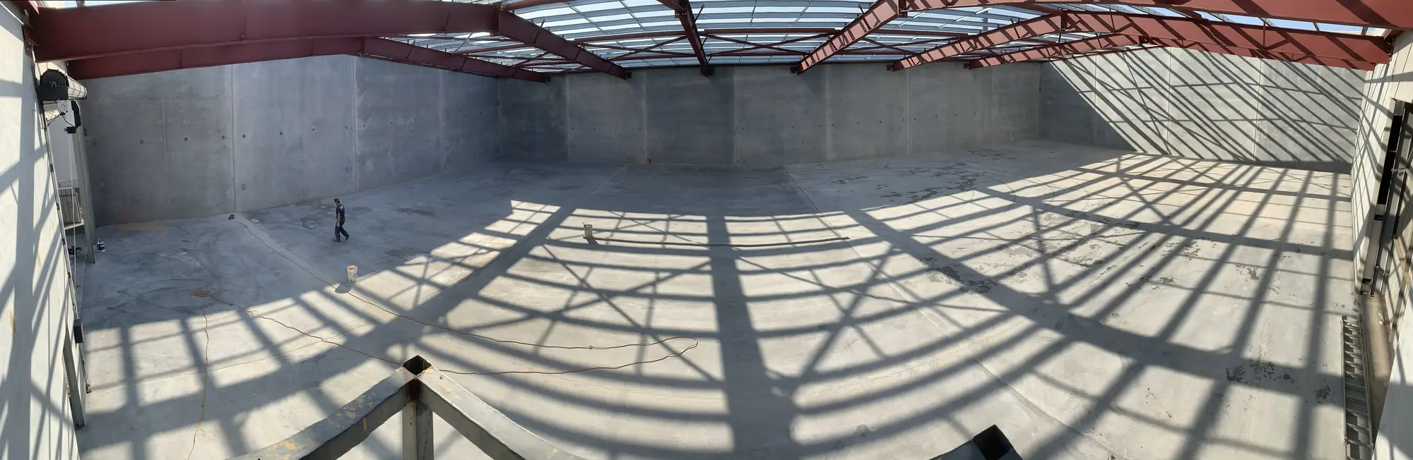 Concrete slab in a huge warehouse.