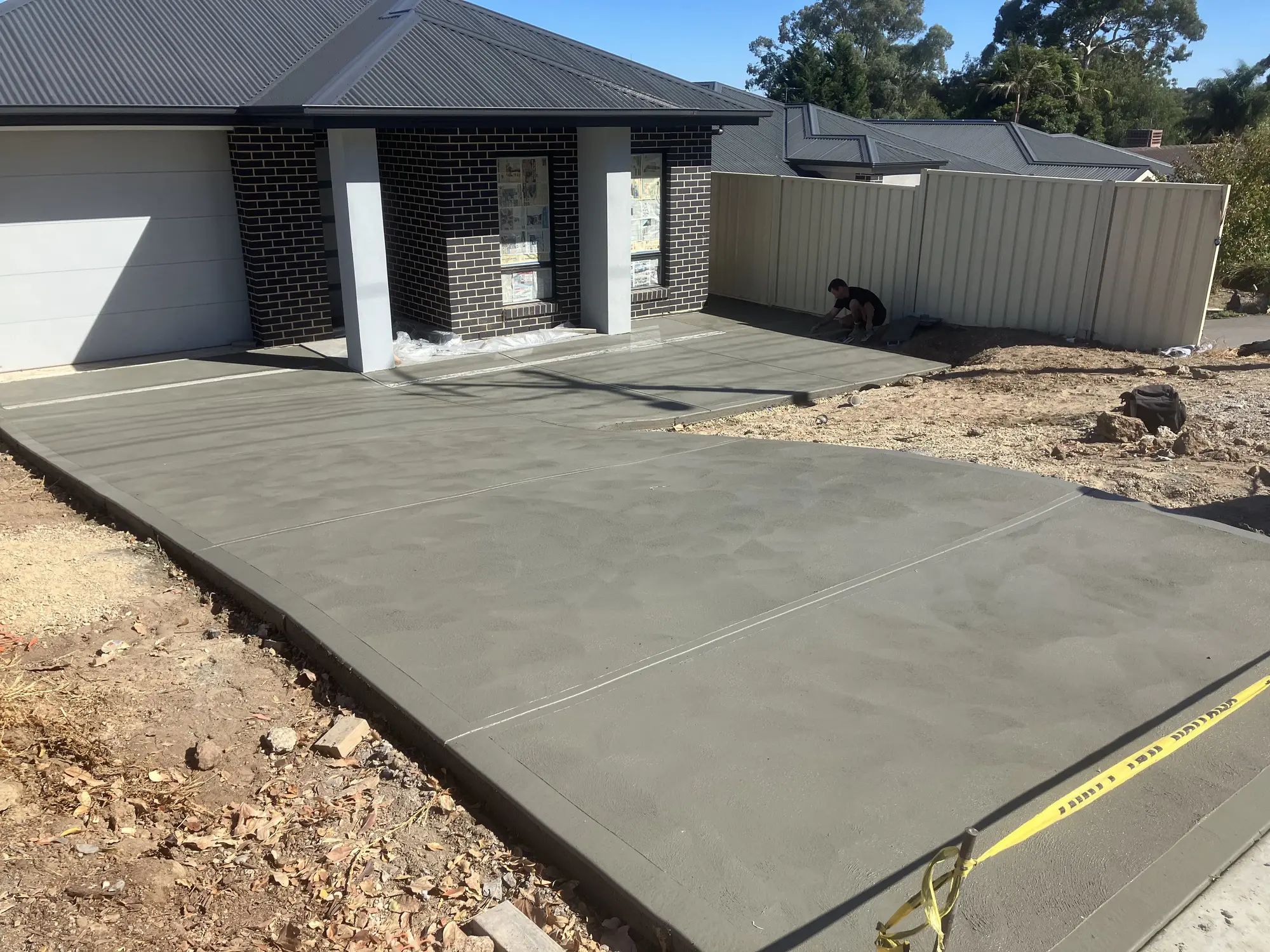 Plain concrete driveway.