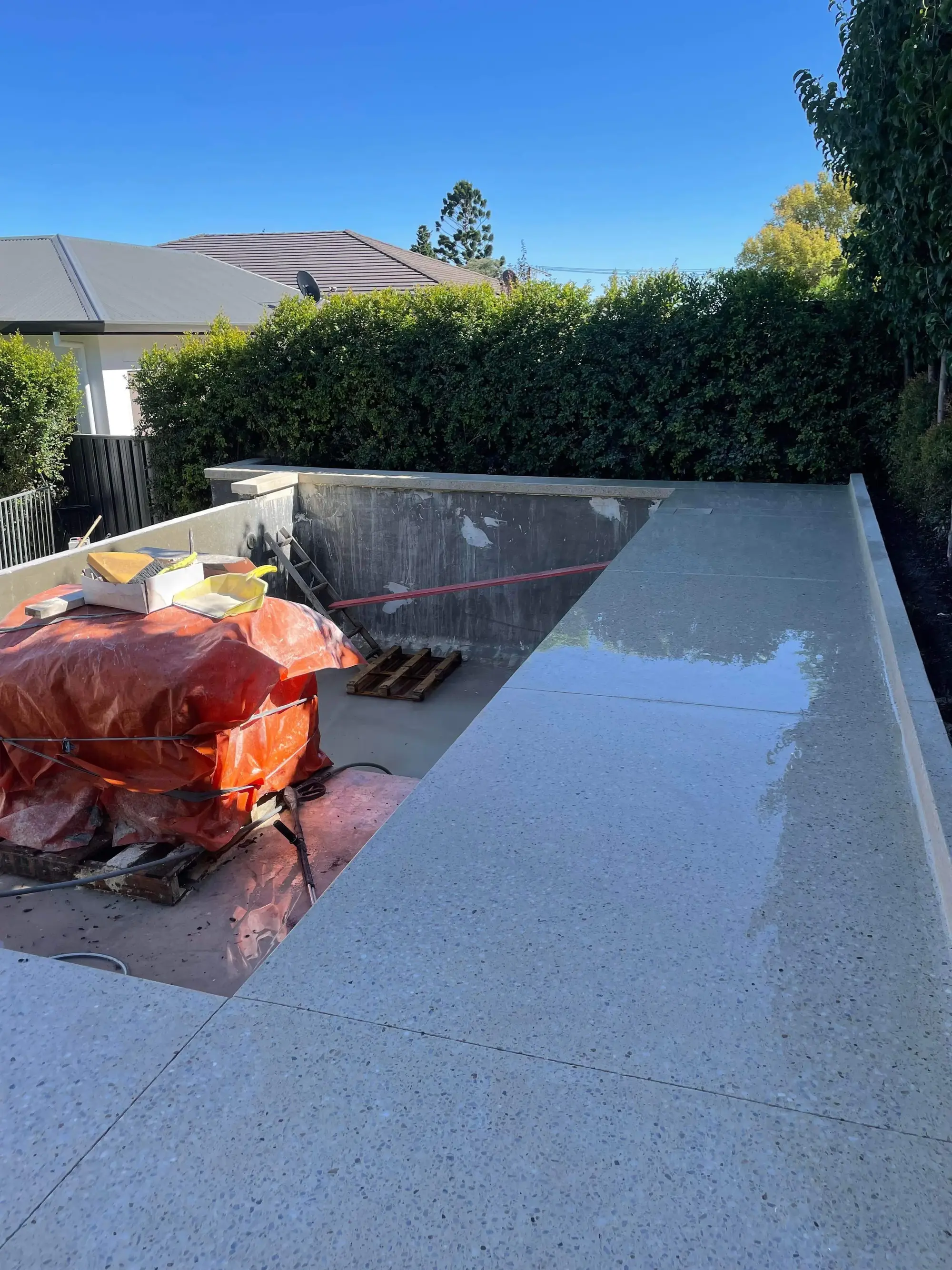 Swimming pool concrete surrounds.